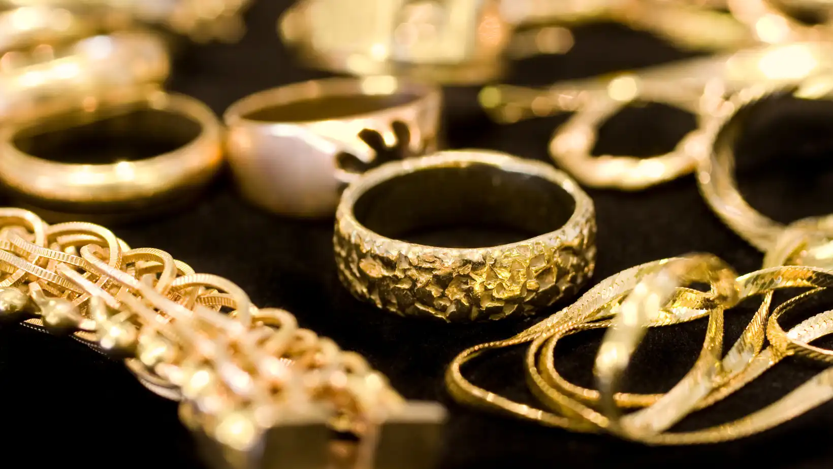 A pile of old gold jewelry