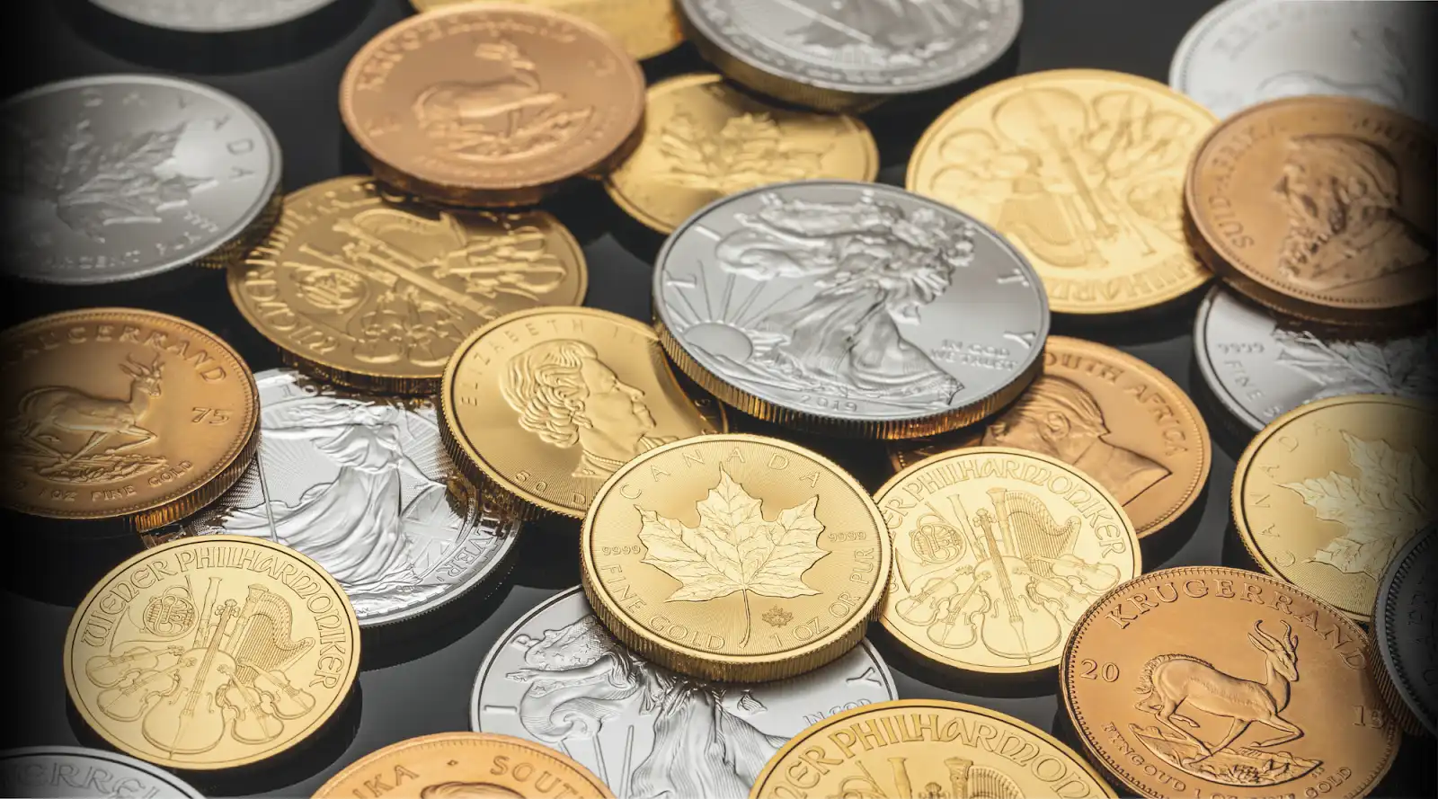 pile of gold and silver investment coins