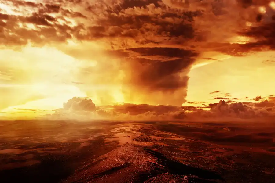 Mushroom cloud over a desolate landscape
