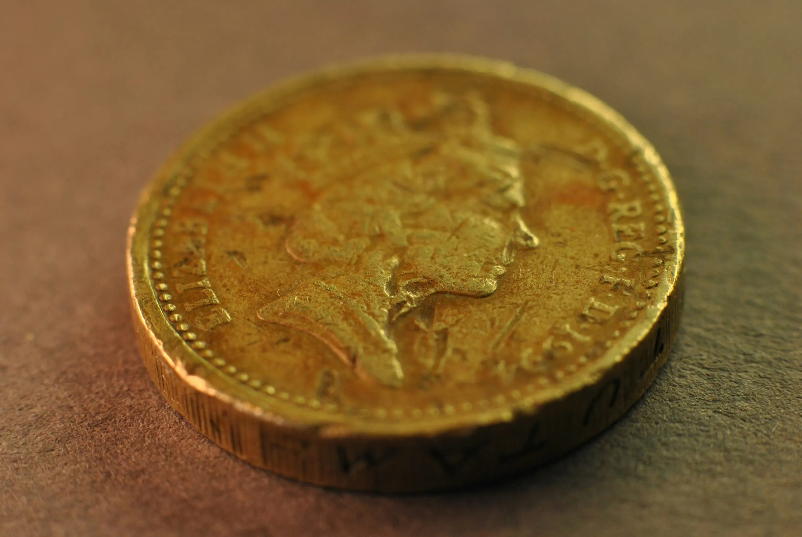damaged gold coin