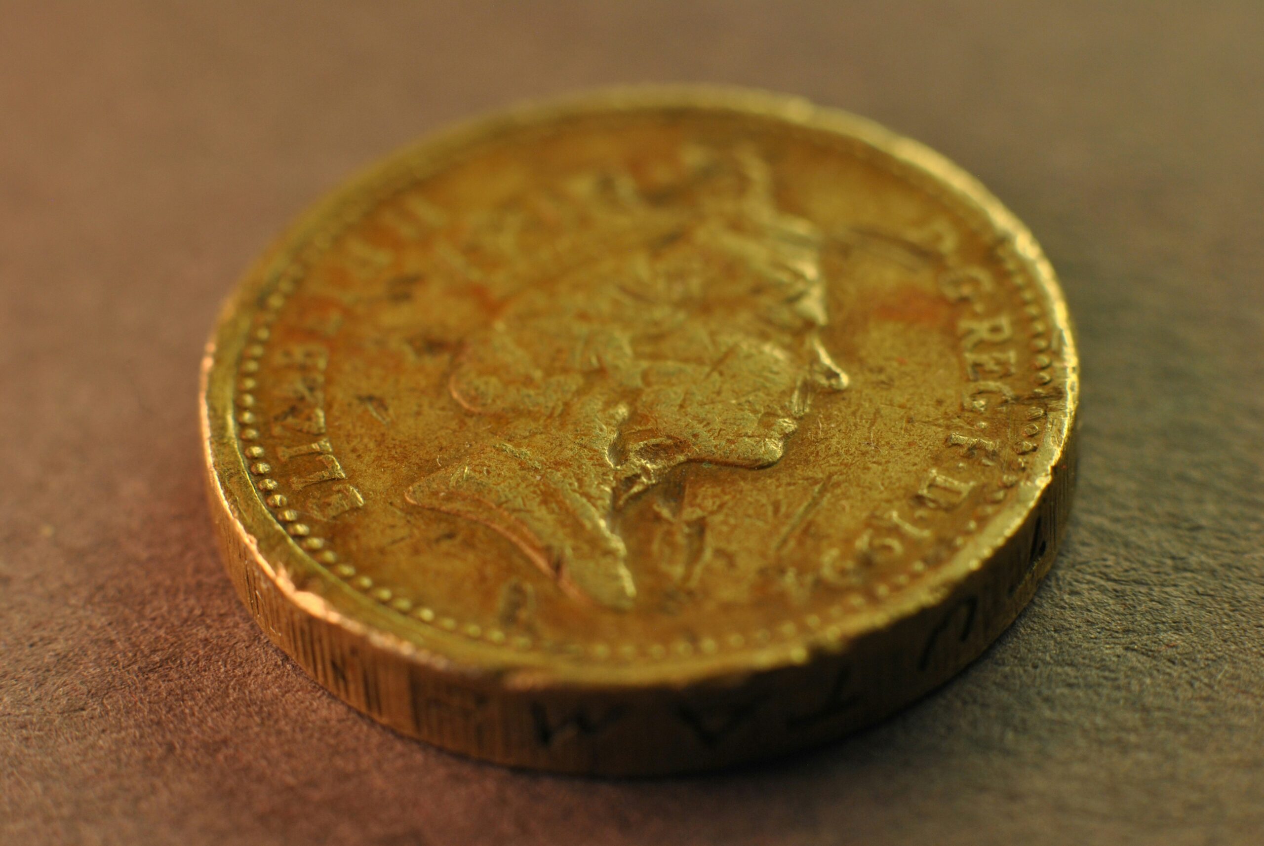 damaged gold coin